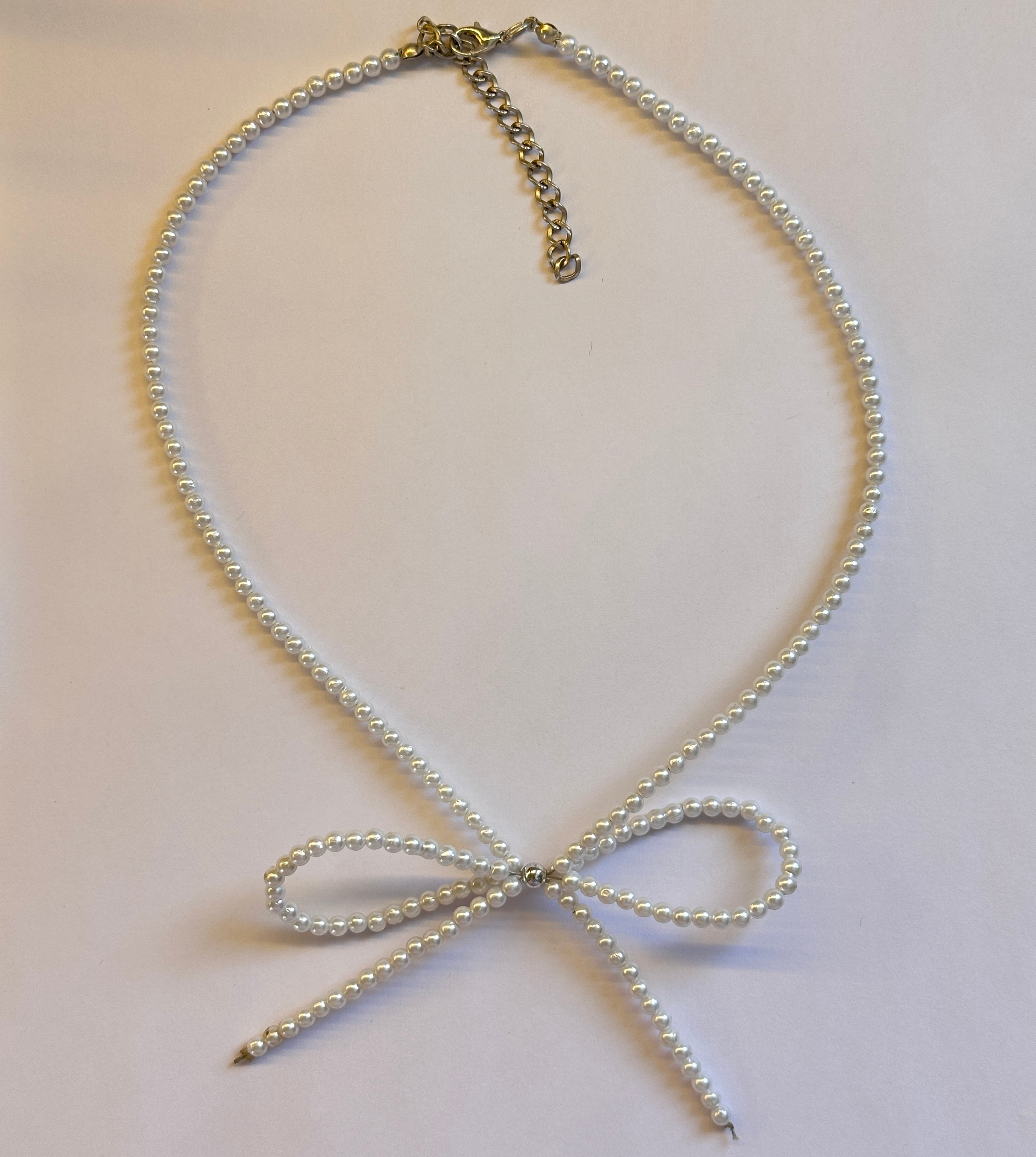 Beaded bow necklace
