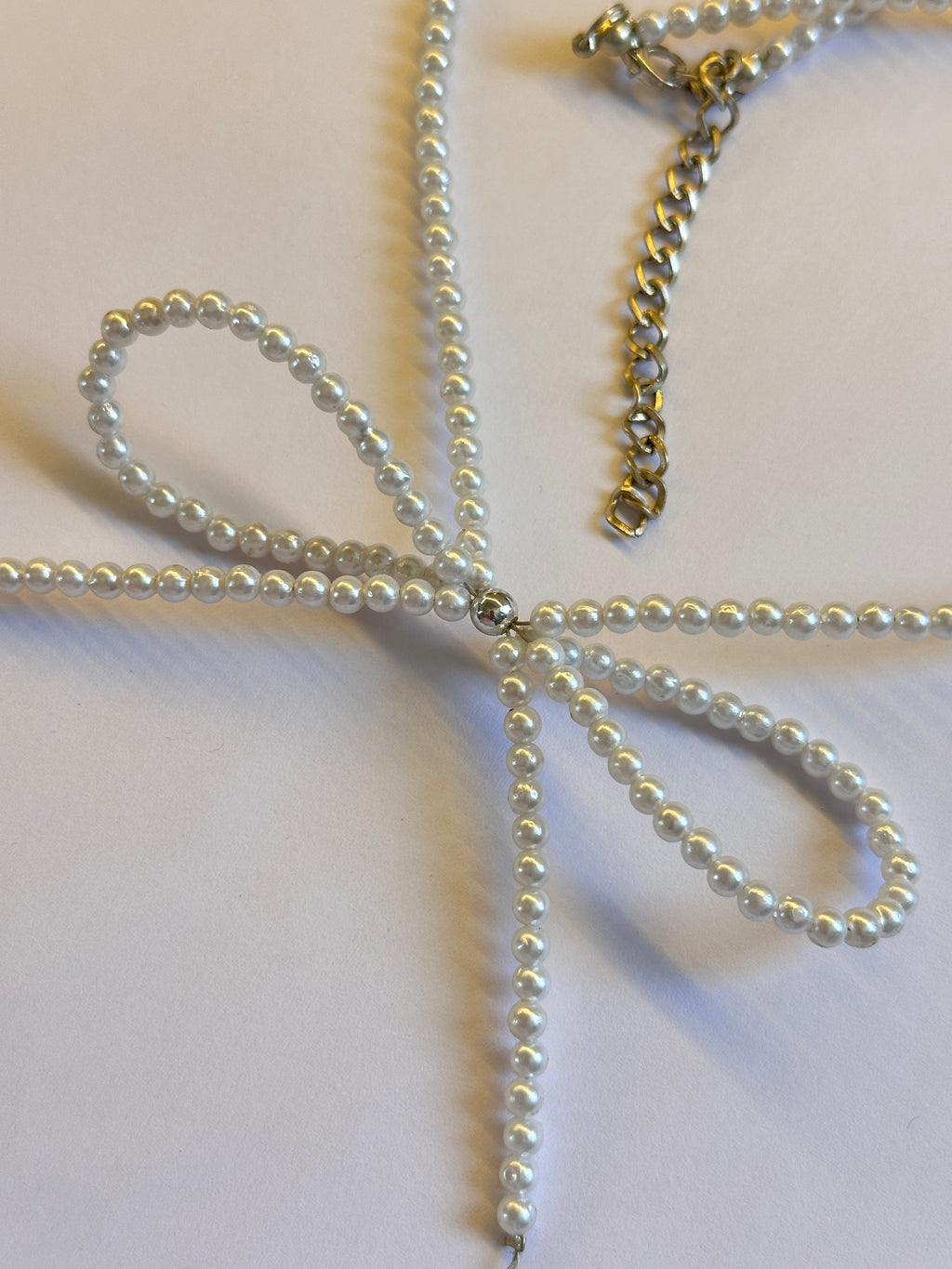 Beaded bow necklace