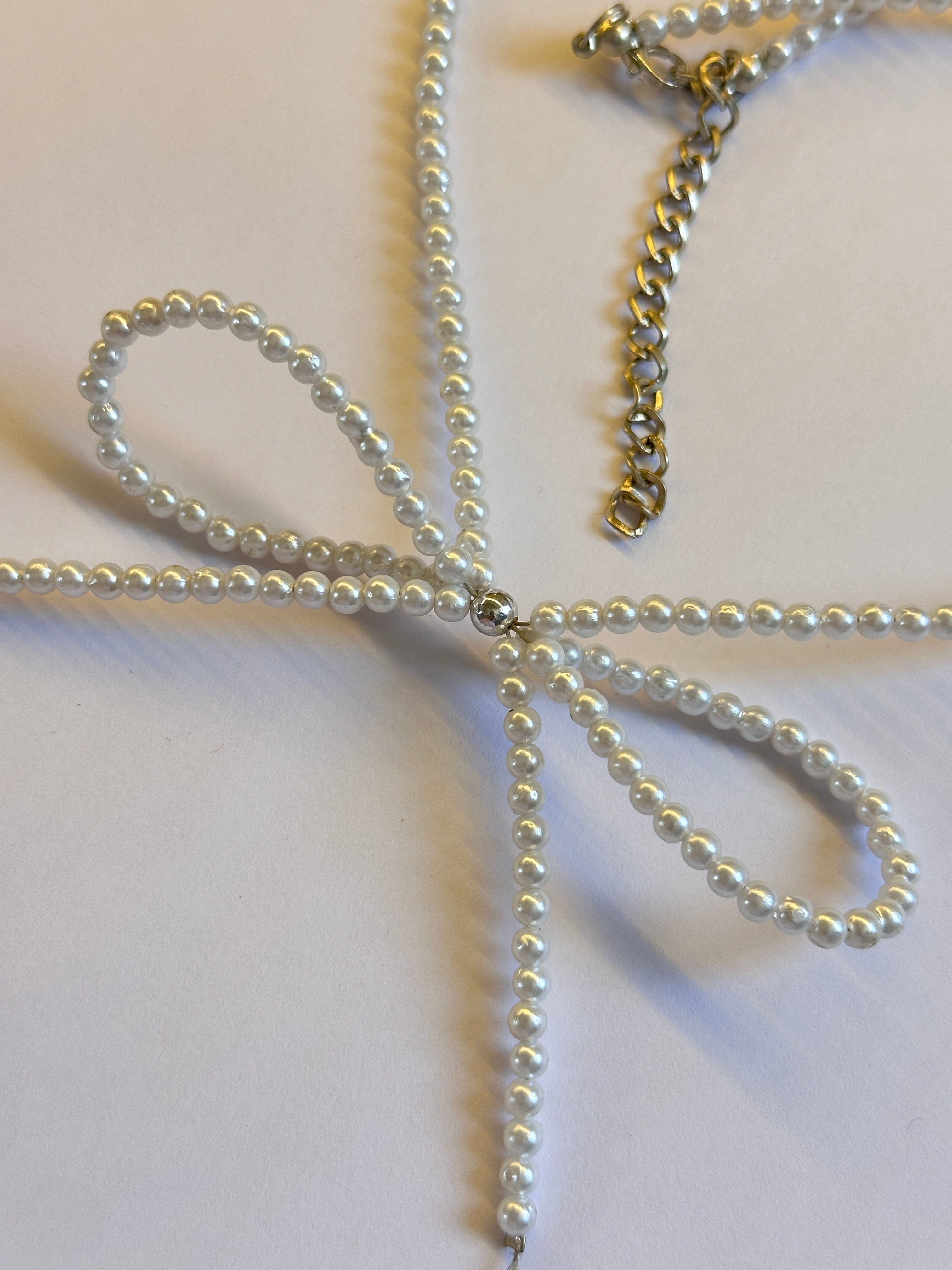 Beaded bow necklace