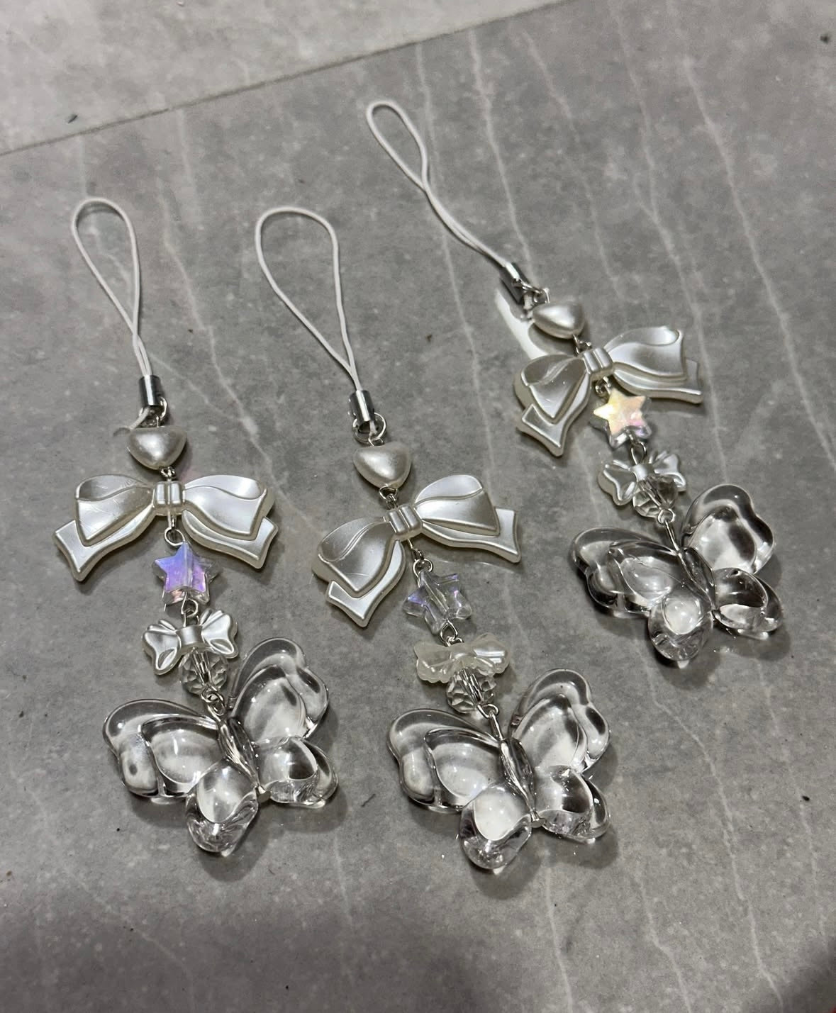 Transparent butterfly phone charm