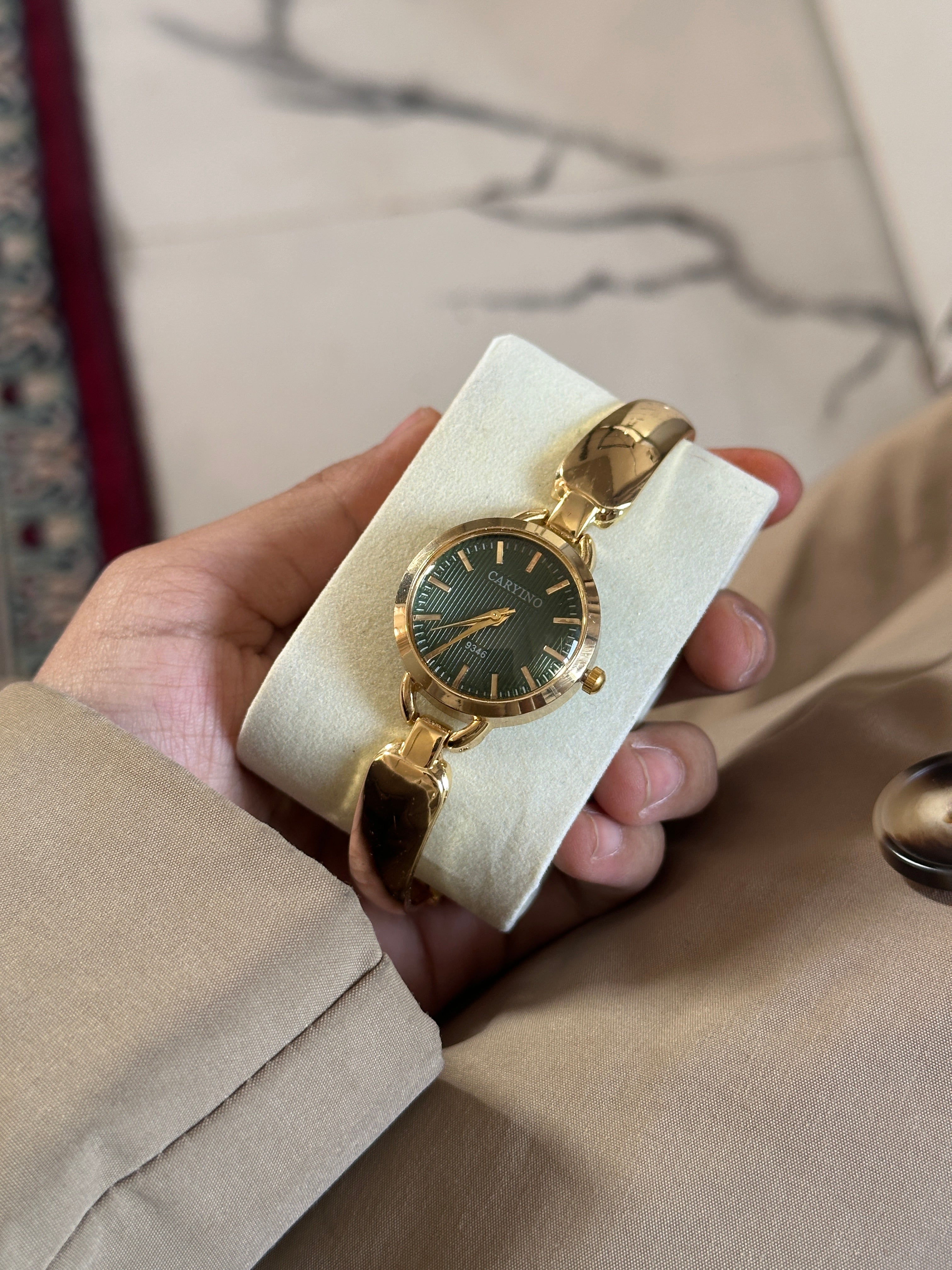 Green dial old money watch